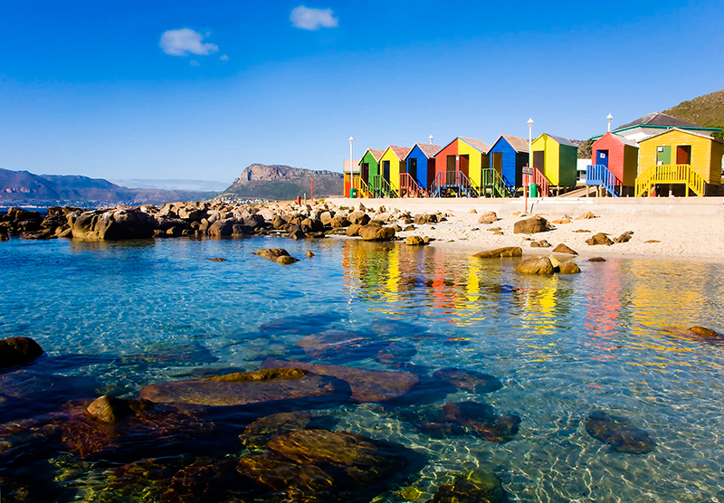Turismo na África do Sul: Mouzenberg é famosa pelas suas casinhas coloridas à beira da praia